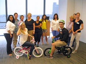 Laughter and fun brought this group together during our charity Buildin' Bikes team building activity