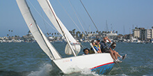 A group picks up speed during their sailing team building activity in Irvine California