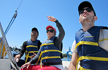Checking the wind during our sailing team building activity in Redwood City California