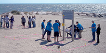 Groups navigate Precious Cargo on the beach during our Pursuit team building activity in Connecticut