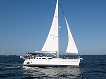 Crew members navigate Tampa Bay during our sailing team building activity in Tampa / St. Petersburg Florida