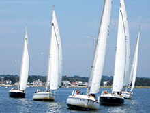 Sailboat regatta during our sailing team building activity in Maryland