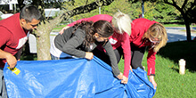 Group navigates the Tarp Turnover team building activity in Pennsylvania