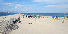 Groups gather on the beach to begin their Pursuit team building activity in Providence Rhode Island