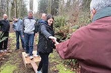 Teammate lends a helping hand during our low ropes team building activities in Seattle Washington