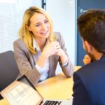 Young attractive woman during job interview